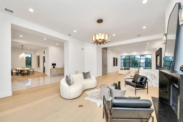 Dining room, Fireplace, Interior, Living room, Pendant Lights, Recessed Lighting, Wood Texture Flooring