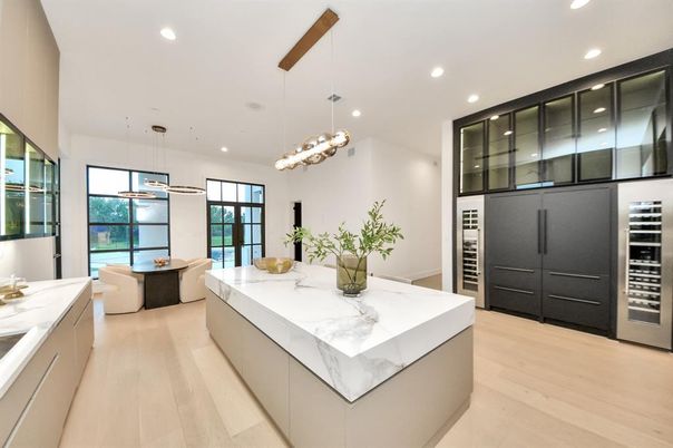 Dining room, Interior, Kitchen, Pendant Lights, Recessed Lighting, Stainless Steel Appliances, Wood Texture Flooring