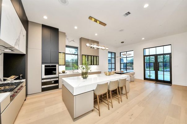 Interior, Kitchen, Marble Walls, Pendant Lights, Recessed Lighting, Stainless Steel Appliances, Wood Texture Flooring