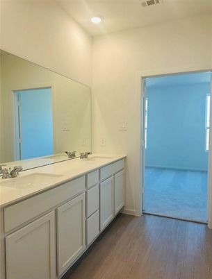 Bathroom, Dual Sink Vanities, Interior, Recessed Lighting, Wood Texture Flooring