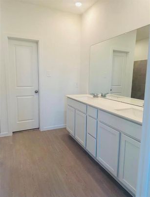 Bathroom, Dual Sink Vanities, Interior, Recessed Lighting, Wood Texture Flooring