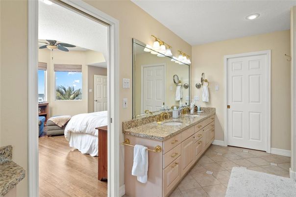 Bathroom, Bedroom, Dual Sink Vanities, Interior, Recessed Lighting, Wood Texture Flooring