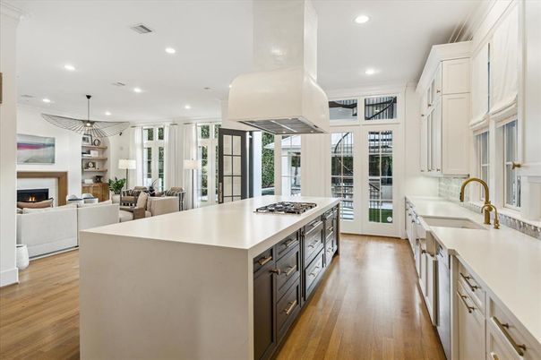 Fireplace, Interior, Kitchen, Living room, Pendant Lights, Recessed Lighting, Stainless Steel Appliances, Wood Texture Flooring