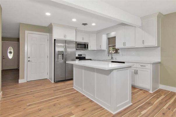 Interior, Kitchen, Pendant Lights, Recessed Lighting, Stainless Steel Appliances, Wood Texture Flooring