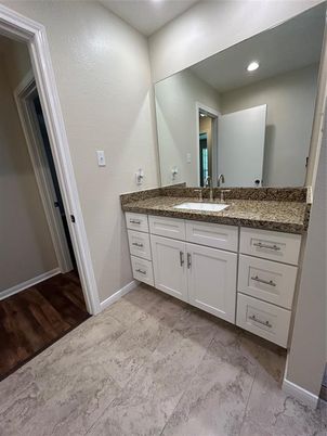 Bathroom, Dual Sink Vanities, Interior, Recessed Lighting, Wood Texture Flooring