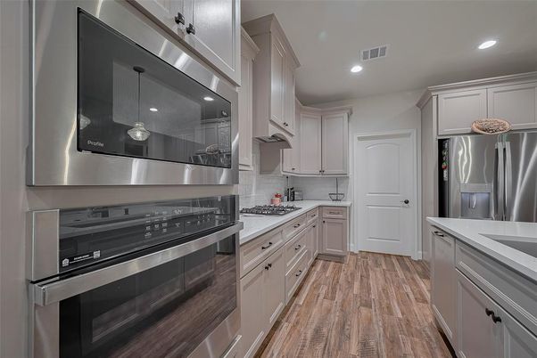 Interior, Kitchen, Pendant Lights, Recessed Lighting, Stainless Steel Appliances, Wood Texture Flooring