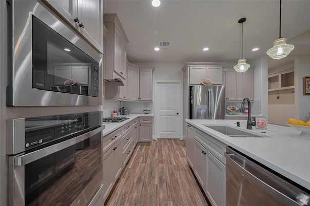 Interior, Kitchen, Pendant Lights, Recessed Lighting, Stainless Steel Appliances, Wood Texture Flooring