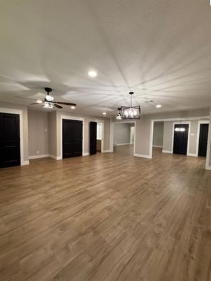 Chandelier, Empty room, Interior, Recessed Lighting, Wood Texture Flooring