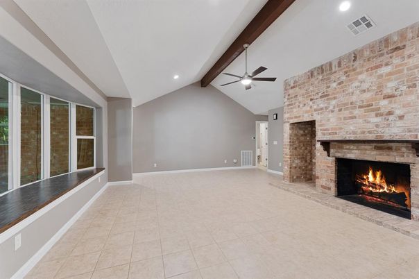 Empty room, Fireplace, Interior, Recessed Lighting, Stone Walls, Wooden Beams