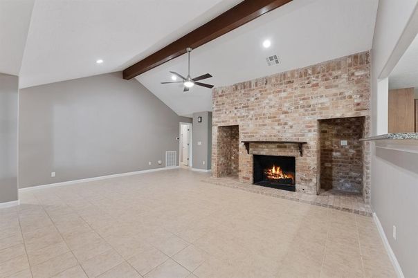 Empty room, Fireplace, Interior, Recessed Lighting, Stone Walls, Wooden Beams