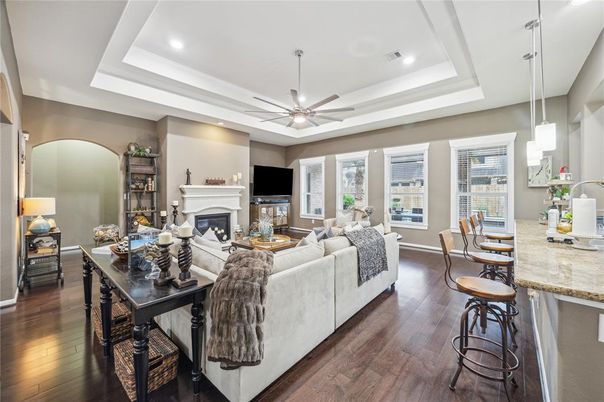 Dining room, Fireplace, Interior, Living room, Pendant Lights, Recessed Lighting, Wood Texture Flooring