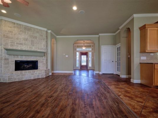 Empty room, Fireplace, Interior, Pendant Lights, Recessed Lighting, Stone Walls, Wood Texture Flooring