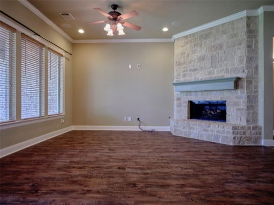 Empty room, Fireplace, Interior, Recessed Lighting, Stone Walls, Wood Texture Flooring