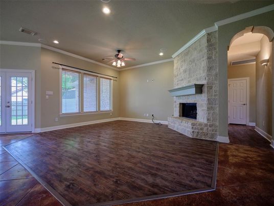 Empty room, Fireplace, Interior, Recessed Lighting, Stone Walls, Wood Texture Flooring
