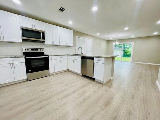 Interior, Kitchen, Pendant Lights, Recessed Lighting, Stainless Steel Appliances, Wood Texture Flooring