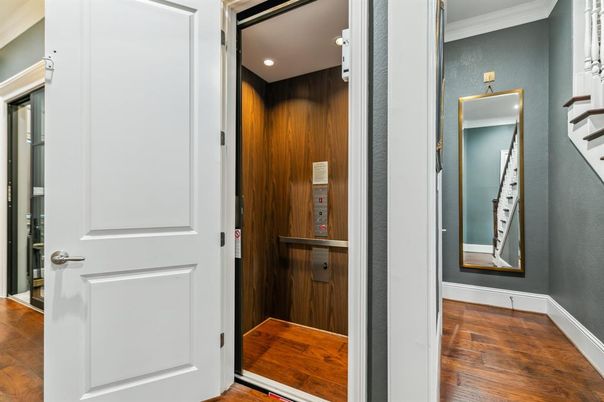 Elevator, Interior, Recessed Lighting, Wood Texture Flooring, Wooden Walls