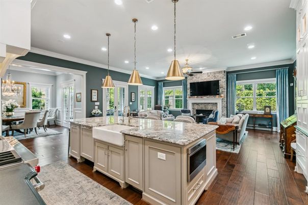 Chandelier, Dining room, Fireplace, Interior, Kitchen, Living room, Pendant Lights, Recessed Lighting, Stainless Steel Appliances, Wood Texture Flooring