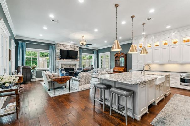 Dining room, Fireplace, Interior, Kitchen, Living room, Pendant Lights, Recessed Lighting, Stainless Steel Appliances, Stone Walls, Wood Texture Flooring