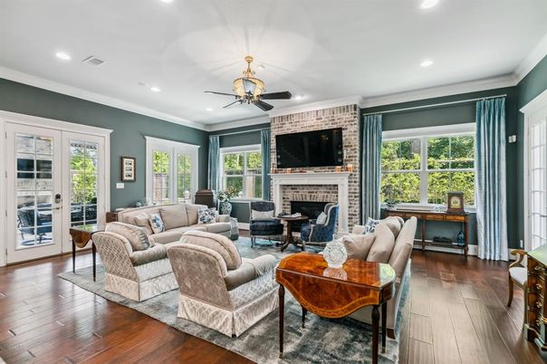 Fireplace, Interior, Living room, Recessed Lighting, Stone Walls, Wood Texture Flooring