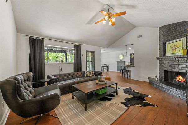 Fireplace, Interior, Living room, Pendant Lights, Stone Walls, Wood Texture Flooring