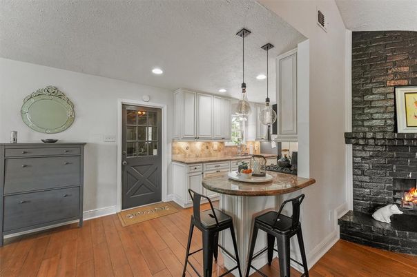 Fireplace, Interior, Kitchen, Pendant Lights, Recessed Lighting, Stone Walls, Wood Texture Flooring