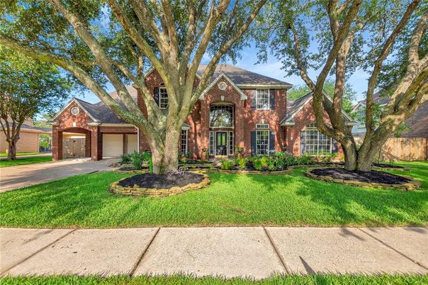 Attached, Exterior, Facade, Brick Facade, French Provincial
