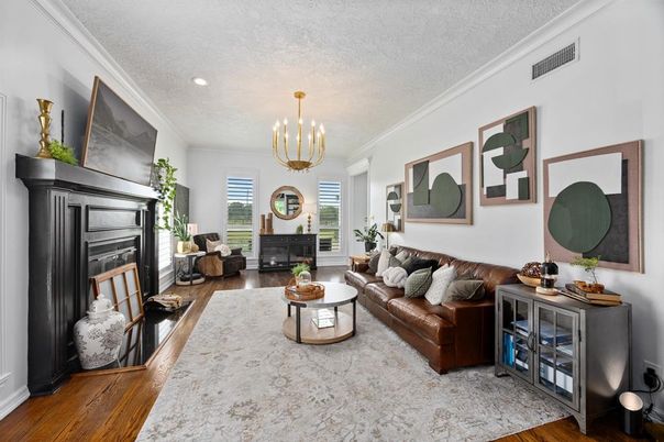 Chandelier, Fireplace, Interior, Living room, Pendant Lights, Recessed Lighting, Wood Texture Flooring