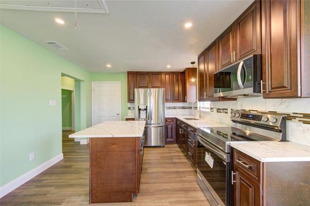 Interior, Kitchen, Pendant Lights, Recessed Lighting, Stainless Steel Appliances, Wood Texture Flooring