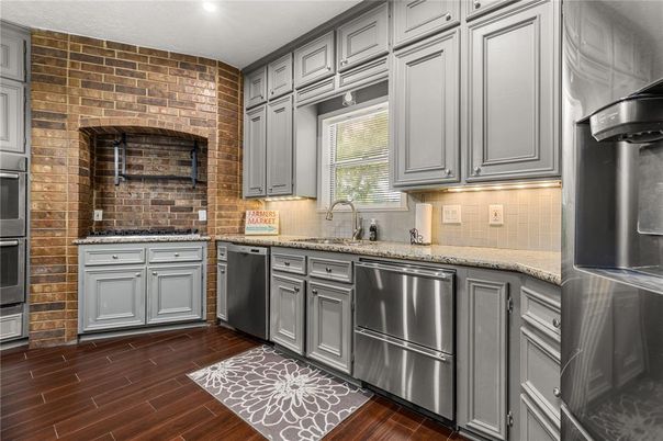 Interior, Kitchen, Recessed Lighting, Stainless Steel Appliances, Stone Walls, Wood Texture Flooring