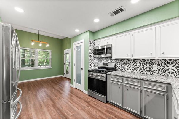 Interior, Kitchen, Pendant Lights, Recessed Lighting, Stainless Steel Appliances, Wood Texture Flooring