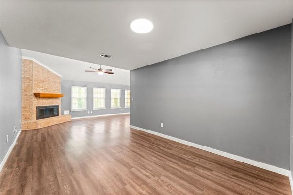 Empty room, Fireplace, Interior, Recessed Lighting, Wood Texture Flooring