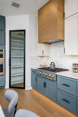 Interior, Kitchen, Marble Walls, Stainless Steel Appliances, Wood Texture Flooring