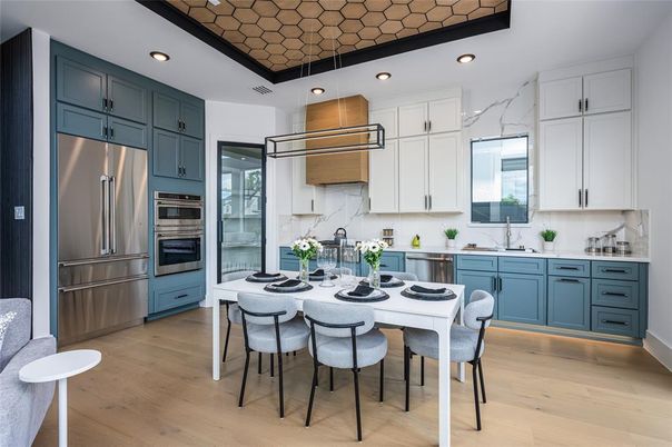 Interior, Kitchen, Marble Walls, Recessed Lighting, Stainless Steel Appliances, Wood Texture Flooring