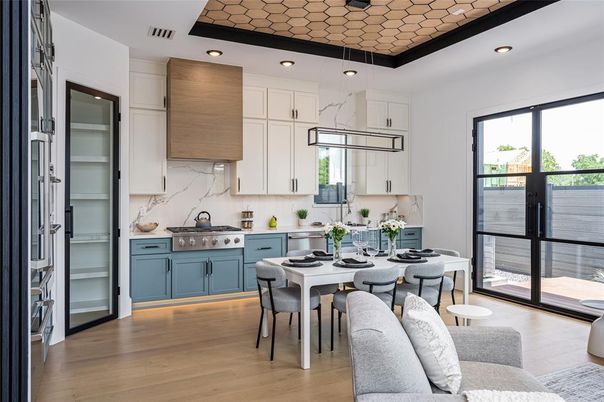 Dining room, Interior, Kitchen, Marble Walls, Pendant Lights, Recessed Lighting, Stainless Steel Appliances, Wood Texture Flooring