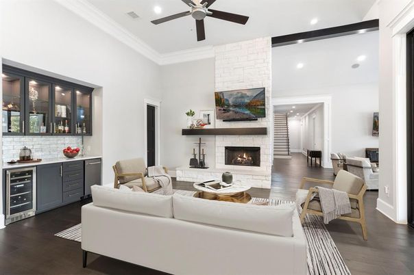 Fireplace, Interior, Living room, Recessed Lighting, Stone Walls, Wood Texture Flooring
