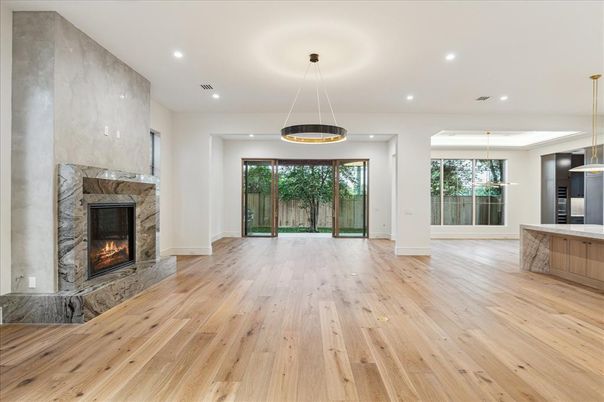 Empty room, Fireplace, Interior, Pendant Lights, Recessed Lighting, Wood Texture Flooring