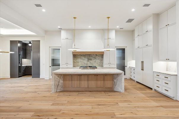 Interior, Kitchen, Marble Walls, Pendant Lights, Recessed Lighting, Stainless Steel Appliances, Wood Texture Flooring
