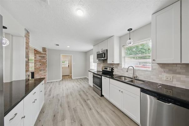 Interior, Kitchen, Pendant Lights, Recessed Lighting, Stainless Steel Appliances, Wood Texture Flooring