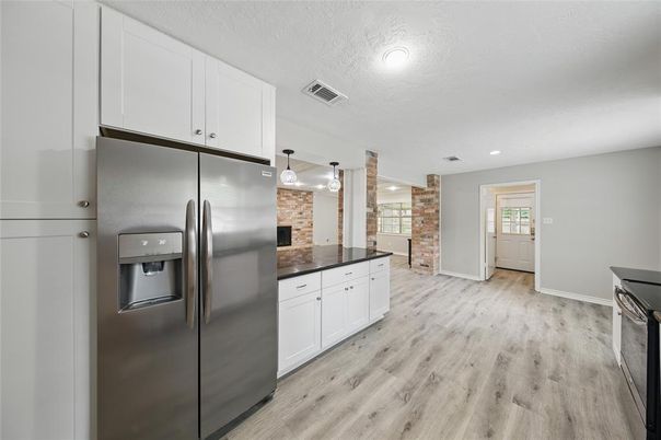 Interior, Kitchen, Pendant Lights, Recessed Lighting, Stainless Steel Appliances, Wood Texture Flooring