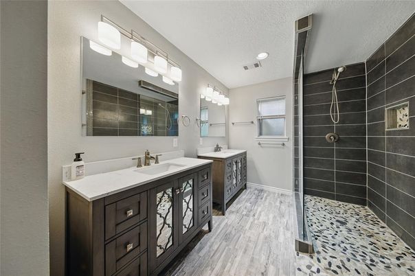 Bathroom, Dual Sink Vanities, Glass Shower, Interior, Recessed Lighting, Wood Texture Flooring