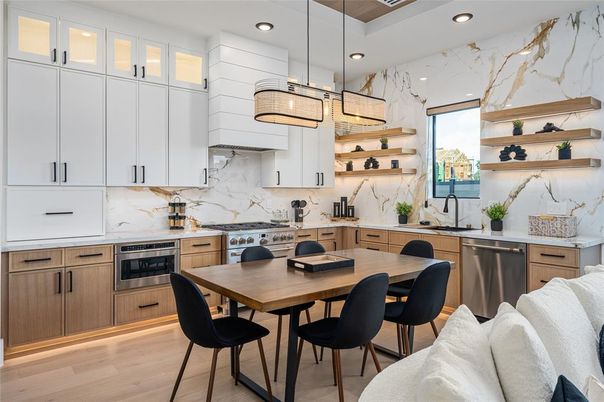 Dining room, Interior, Kitchen, Marble Walls, Pendant Lights, Recessed Lighting, Stainless Steel Appliances, Wood Texture Flooring