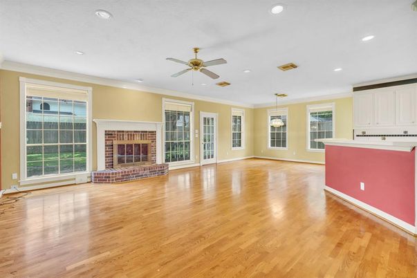 Empty room, Fireplace, Interior, Pendant Lights, Recessed Lighting, Wood Texture Flooring