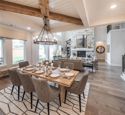 Dining room, Fireplace, Interior, Living room, Recessed Lighting, Stone Walls, Wooden Beams, Wood Texture Flooring