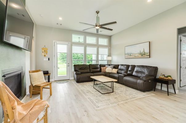 Fireplace, Interior, Living room, Recessed Lighting, Wood Texture Flooring