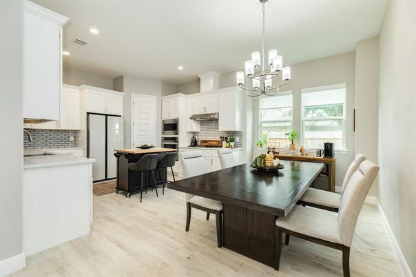Chandelier, Dining room, Interior, Kitchen, Pendant Lights, Recessed Lighting, Stainless Steel Appliances, Wood Texture Flooring