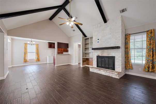 Chandelier, Empty room, Fireplace, Interior, Stone Walls, Wooden Beams, Wood Texture Flooring