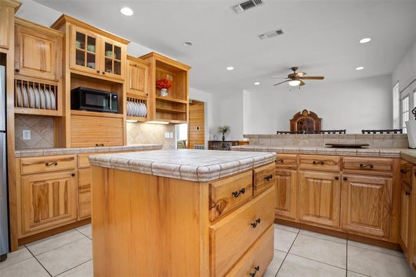 Interior, Kitchen, Recessed Lighting, Tile Countertops