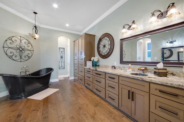 Bathroom, Dual Sink Vanities, Free Standing Baths, Interior, Pendant Lights, Recessed Lighting, Wood Texture Flooring