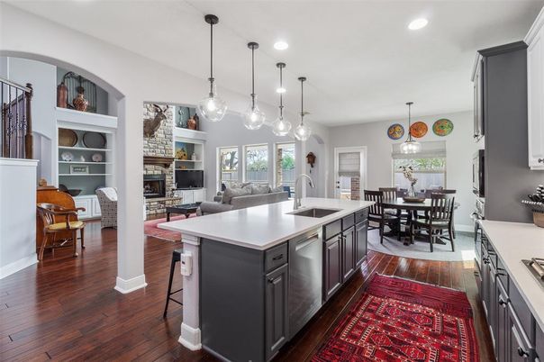 Dining room, Fireplace, Interior, Kitchen, Living room, Pendant Lights, Recessed Lighting, Wood Texture Flooring