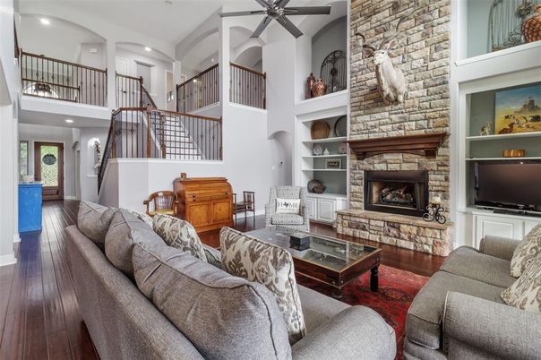 Fireplace, Interior, Living room, Recessed Lighting, Stone Walls, Wood Texture Flooring